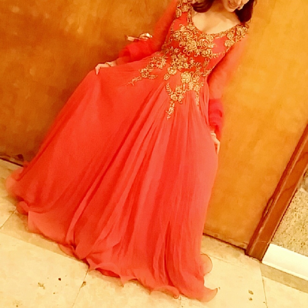 Indian/ Pakistani wedding or party gown. Color is closer to the second pic